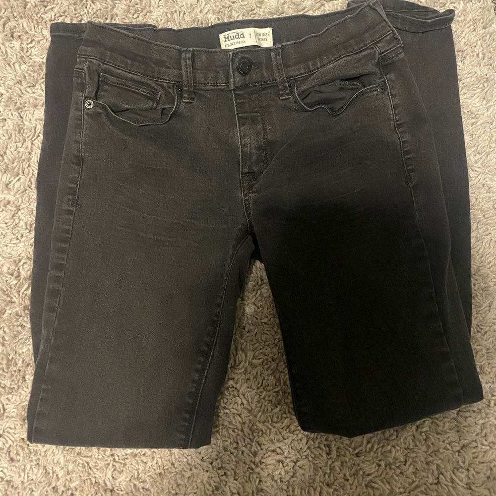 Low rise skinny black jeans.